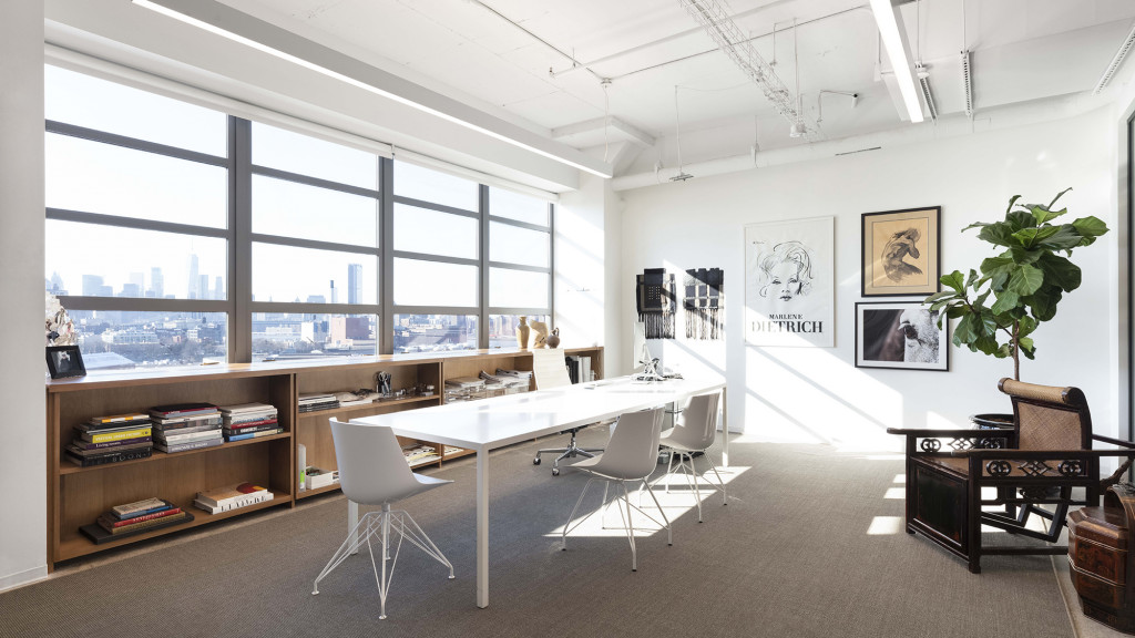 A room with a table and chairs.